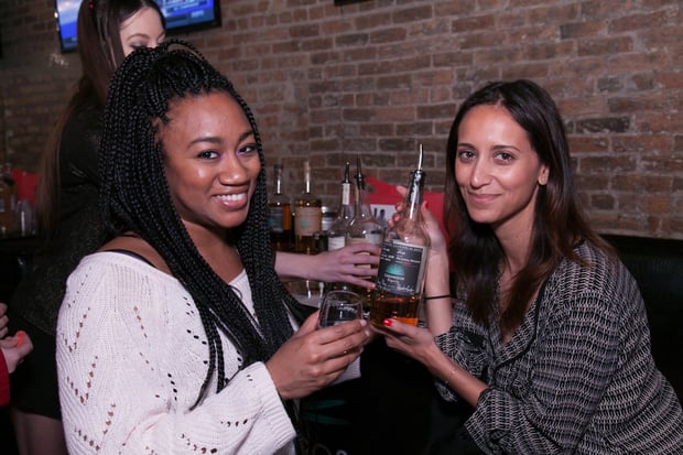 tequila-festival-tasting-general-casamigos-posing-bottle-lady-sample